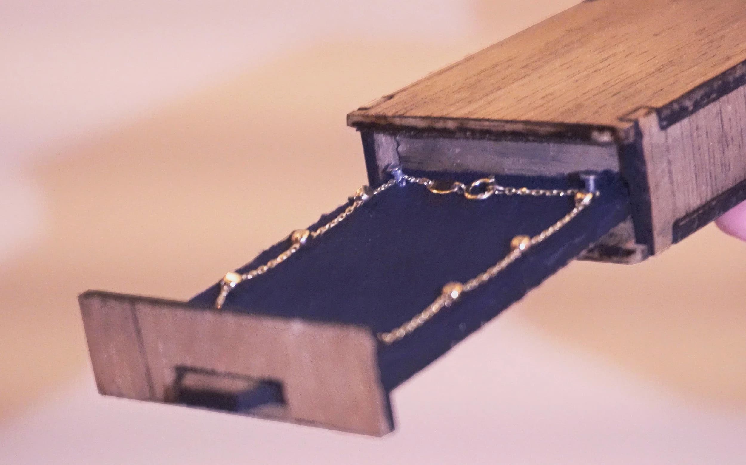 A wooden jewelry box with drawer and soft lining. Another Pinewood Slurpy video.